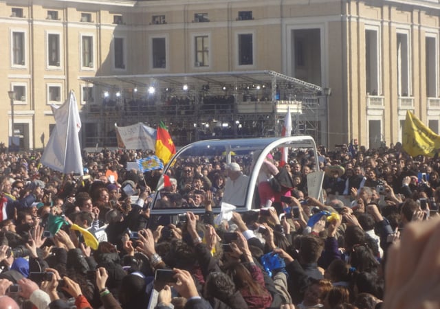 Benedict XVI in a popemobile at his final Wednesday General Audience in St. Peter's Square on 27 February 2013