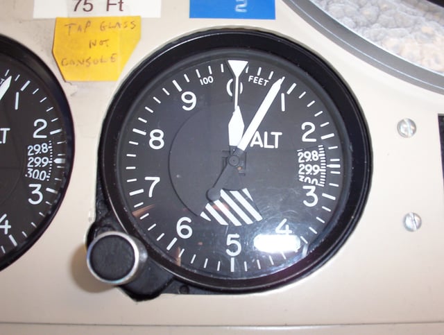 Kollsman-type barometric aircraft altimeter (as used in North America) displaying an altitude of 80 ft (24 m).