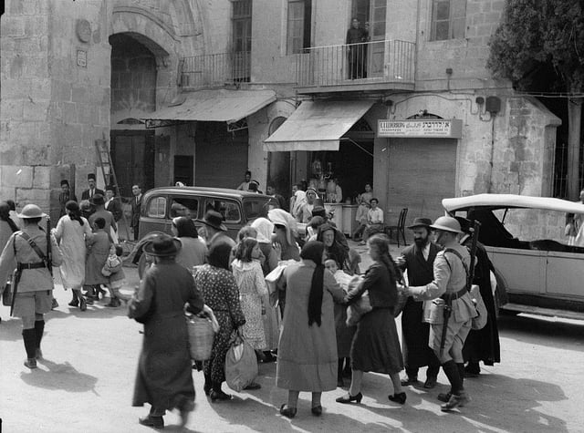 Jews evacuate the Old City of Jerusalem after Arab riots in 1936.