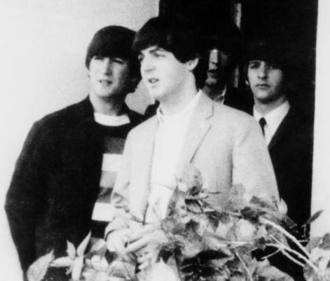 McCartney (center) with the rest of the Beatles in 1964