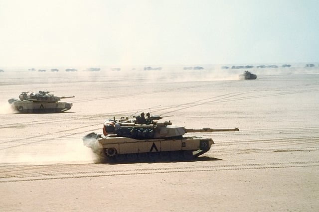 M1 Abrams move out before the Battle of Al Busayyah during the Gulf War
