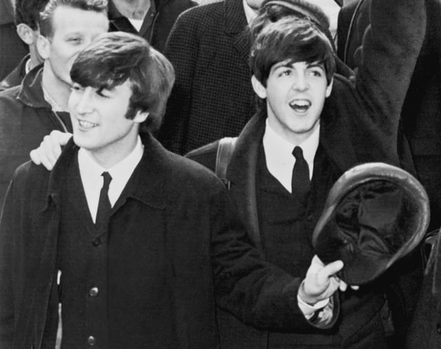Lennon (left) and McCartney (right) in 1964