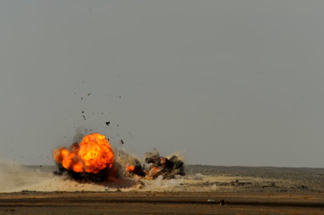 Pakistani air force Mirage III aircraft drops two 500-pound bombs during Falcon Air Meet 2010 at Azraq Royal Jordanian Air Base in Azraq, Jordan