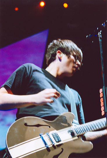 DeLonge performing in 2004 with Blink-182. The group dissolved the next year following internal tension, but reformed in 2009.