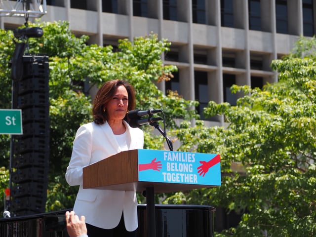 Harris speaking at L.A.'s Families Belong Together protest in June 2018