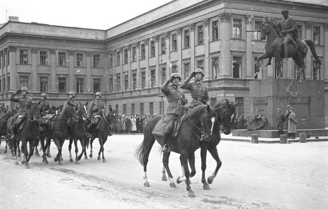 German horse artillery parading before the Saxon Palace, autumn 1939.  Hitler also, in his Mercedes, took part in a parade before the Saxon Palace.