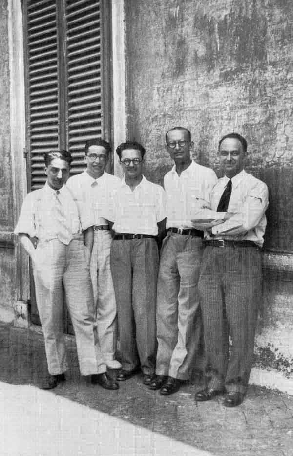 The Via Panisperna boys in the courtyard of Rome University's Physics Institute in Via Panisperna. Left to right: Oscar D'Agostino, Segrè, Edoardo Amaldi, Franco Rasetti and Enrico Fermi.