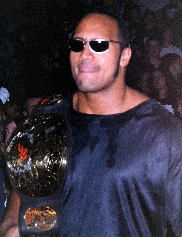 As part of The Corporation, The Rock feuded with Stone Cold Steve Austin and stole Austin's personalized WWF Championship, the "Smoking Skull" belt