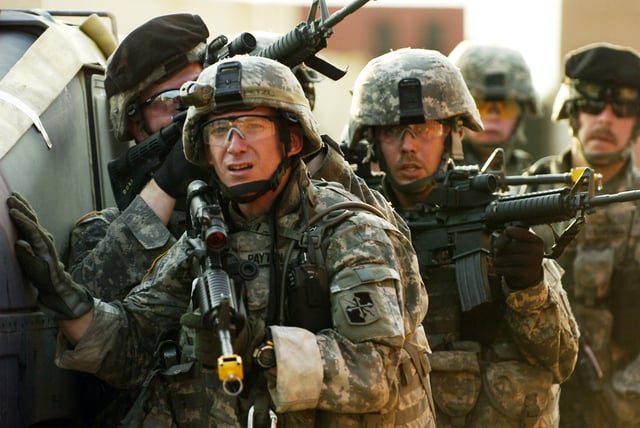 U.S. Army soldiers of 1st Battalion, 175th Infantry Regiment, Maryland Army National Guard conduct an urban cordon and search exercise as part of the army readiness and training evaluation program in the mock city of Balad at Fort Dix, New Jersey