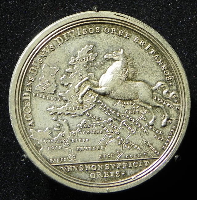A 1714 silver medallion from the reign of George I, referring to his accession in Great Britain. The Saxon Steed runs from Hanover to Britain.