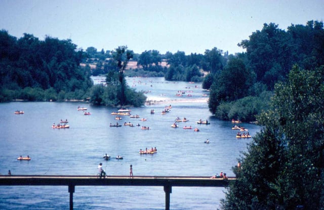 The American River is popular for kayaking and recreational boating.
