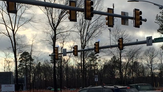 An intersection with blue confirmation lights in Newport News, Virginia