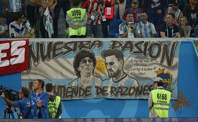 Banners depicting Maradona – such as this where he features alongside Lionel Messi at the 2018 World Cup – often appear at Argentina games