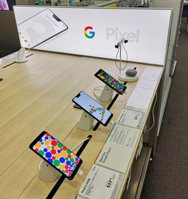 Google Pixel smartphones on display in a store