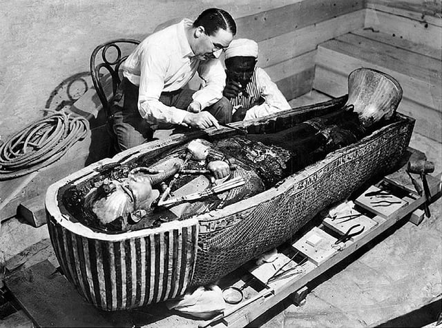 Howard Carter opens the innermost shrine of Tutankhamun's tomb
