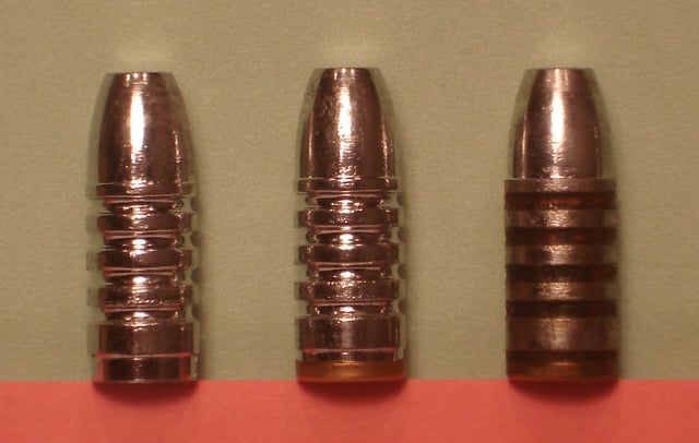 Hard cast solid bullet (left), with gas check (center) and lubrication (right).