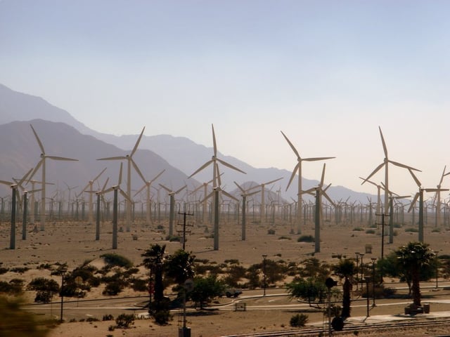 Windmill field outside Palm Springs. Hot temperatures were thought to be pushing California to rolling blackouts, though it was later discovered that market manipulation was the cause.