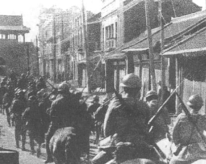 Japanese troops entering Shenyang, Northeast China during the Mukden Incident, 1931