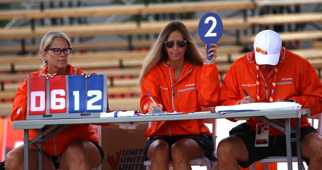 Officials keep score during a beach volleyball match at the 2017 Canada Summer Games