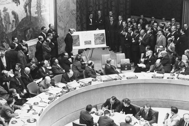 Adlai Stevenson shows aerial photos of Cuban missiles to the United Nations, October 25, 1962.