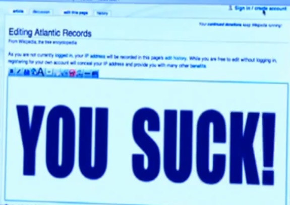 "Weird Al" Yankovic edits the Atlantic Records' Wikipedia page to read "YOU SUCK!" in the music video for the song "White & Nerdy"
