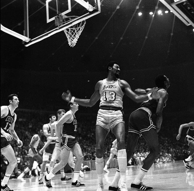Wilt Chamberlain (#13) of Los Angeles Lakers in the 1969 NBA finals vs Boston Celtics
