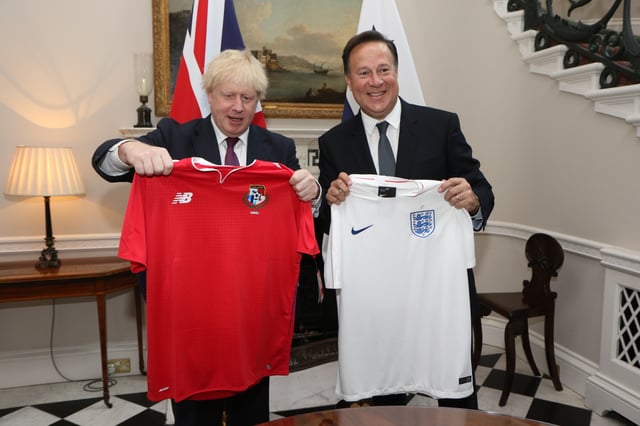 British Foreign Secretary Boris Johnson swapped football shirts with the President of Panama, Juan Carlos Varela in London, May 14, 2018.