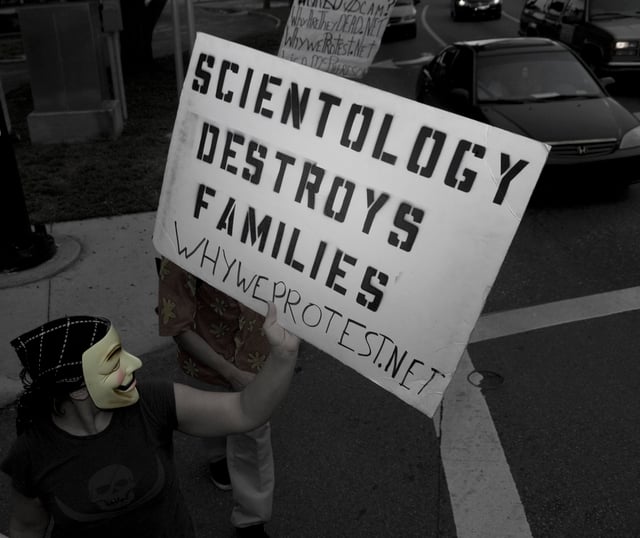 A protester criticizes Scientology