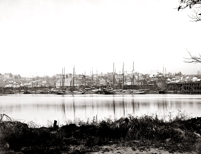 Sailing vessels docked at the Georgetown waterfront, ca. 1865