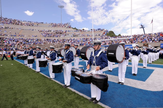 The United States Air Force Drum and Bugle Corps performing prior to the start of a USAFA football game against Idaho State University at Falcon Stadium.