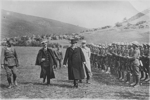 Venizelos reviews a section of the Greek army on the Macedonian front during the First World War, 1917. He is accompanied by Admiral Pavlos Kountouriotis (left) and General Maurice Sarrail (right).