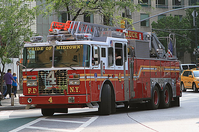 A typical FDNY ladder company, also known as a truck. Pictured is an aerial ladder truck operated by Ladder Co. 4, quartered in Manhattan.