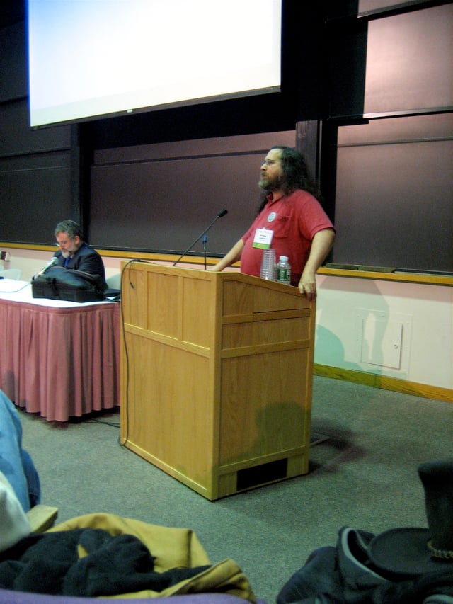 Richard Stallman at the launch of the first draft of the GNU GPLv3 at MIT, Cambridge, Massachusetts, United States. To his right is Columbia Law Professor Eben Moglen, chairman of the Software Freedom Law Center.