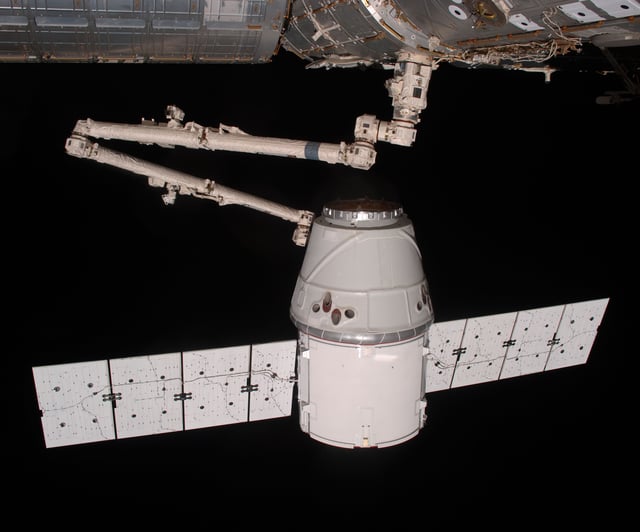 The Dragon spacecraft being berthed to the International Space Station on day four, 25 May 2012.