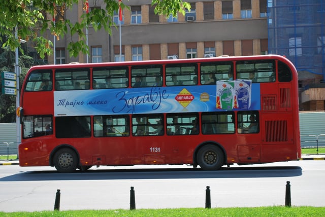 A red double-decker bus in Skopje.