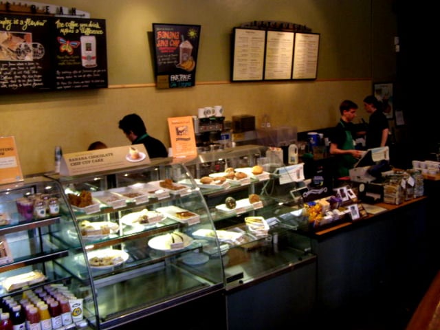 A typical sales area, this one in Peterborough, UK, showing a display of food and the beverage preparation area