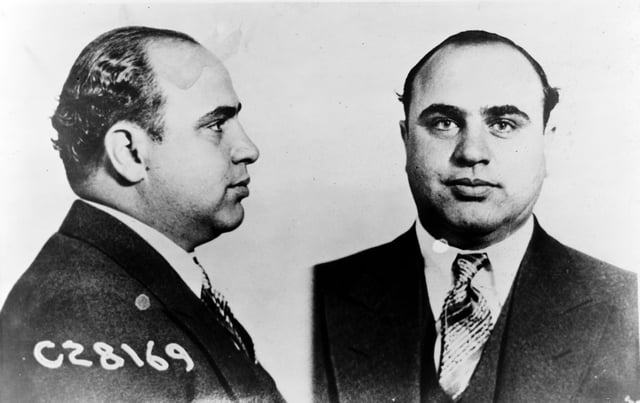 Mug shot of Al Capone. Although never convicted of racketeering, Capone was convicted of income tax evasion by the federal government.