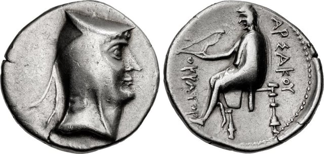 The silver drachma of Arsaces I of Parthia (r. c. 247–211 BC) with the Greek language inscription ΑΡΣΑΚΟΥ "of Arsaces"