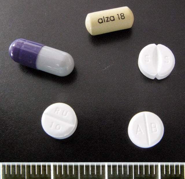 Clockwise from top: Concerta 18 mg, Medikinet 30 mg, Methylphenidat TAD 10 mg, Ritalin 10 mg, Medikinet XL 30 mg.
