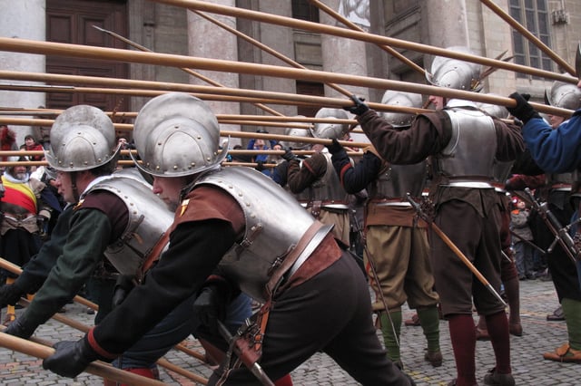First rank with pikes at "charge for horse" static defensive posture, ready to draw swords if needed.