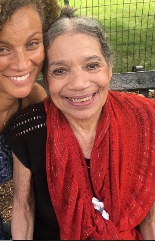 Former ballerina Raven Wilkinson and her friend artist Calida Garcia Rawles enjoying a summer day sitting on a park bench