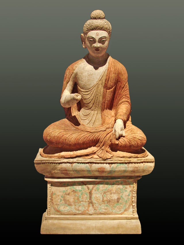 A statue depicting Buddha giving a sermon, from Sarnath, 3,000 km (1,864 mi) southwest of Urumqi, Xinjiang, 8th century