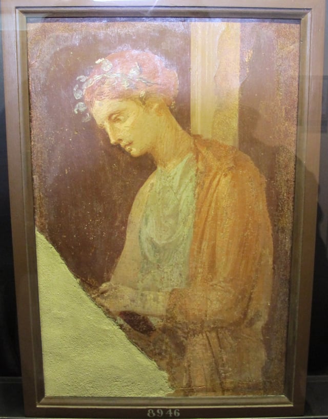 Roman fresco of a blond maiden reading a text, Pompeian Fourth Style (60–79 AD), Pompeii, Italy