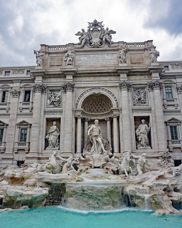 The Trevi Fountain, start to built in the Ancient Rome and completed in 1762 by a design of Gian Lorenzo Bernini. Behind the Palazzo Poli