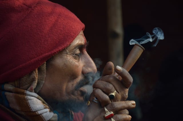 A man smoking cannabis in Kolkata, India.
