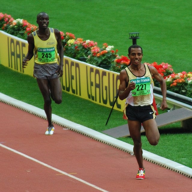 Kenenisa Bekele leading in a long distance track event