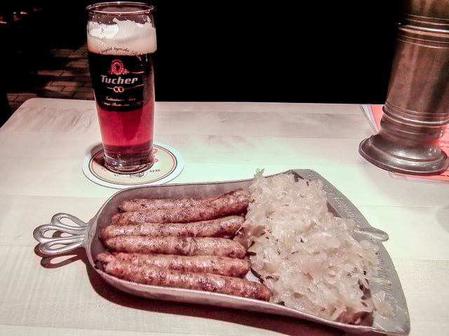 Cooked Nuremberger pork sausages, sauerkraut and beer in Germany