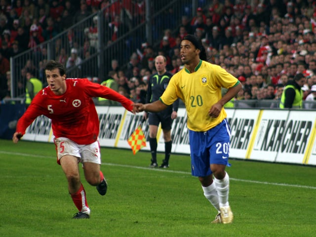 Ronaldinho against Switzerland's Xavier Margairaz