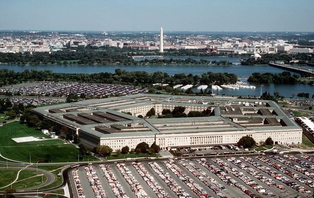 The Pentagon, looking northeast with the Potomac River and Washington Monument in the distance.