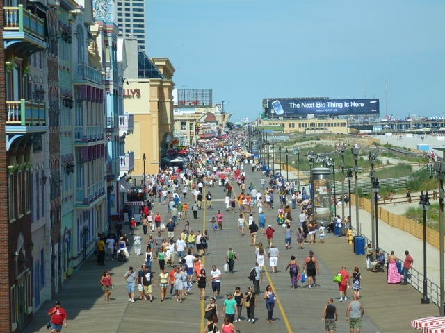 Atlantic City Boardwalk view from Ceasers Atlantic City. Opened in 1870, it was the first boardwalk built in the United States. At 5.5 miles long, it is also the longest in the world.